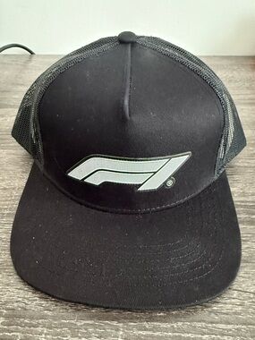 F1 Branded Black Trucker Hat with White Stylized Logo